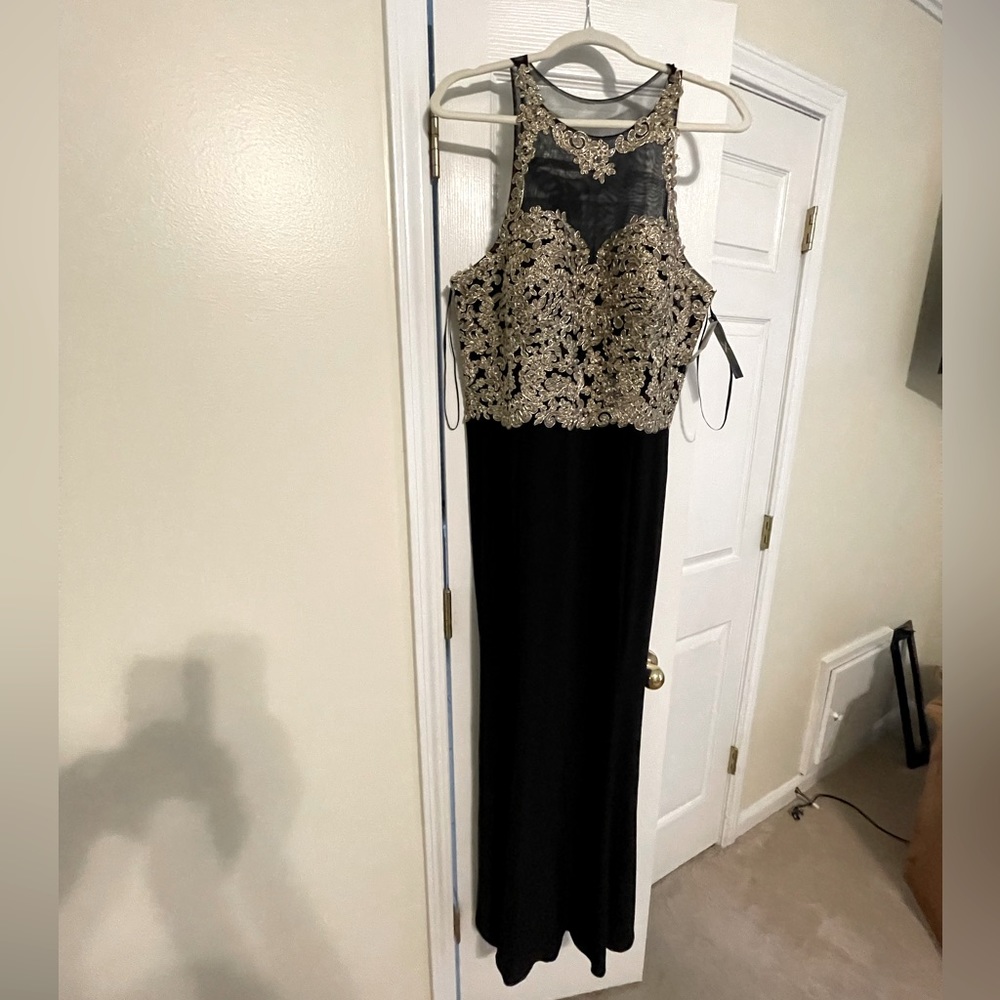 Evening wear by Xscape - Black & Gold